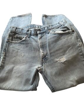 Heavily Distressed Vintage 70s, 80s Levi's Tapered Leg Women’s Jeans